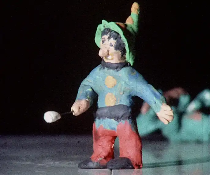 Film still from the film Plasticine. The image shows the main character, a magician made of plasticine.